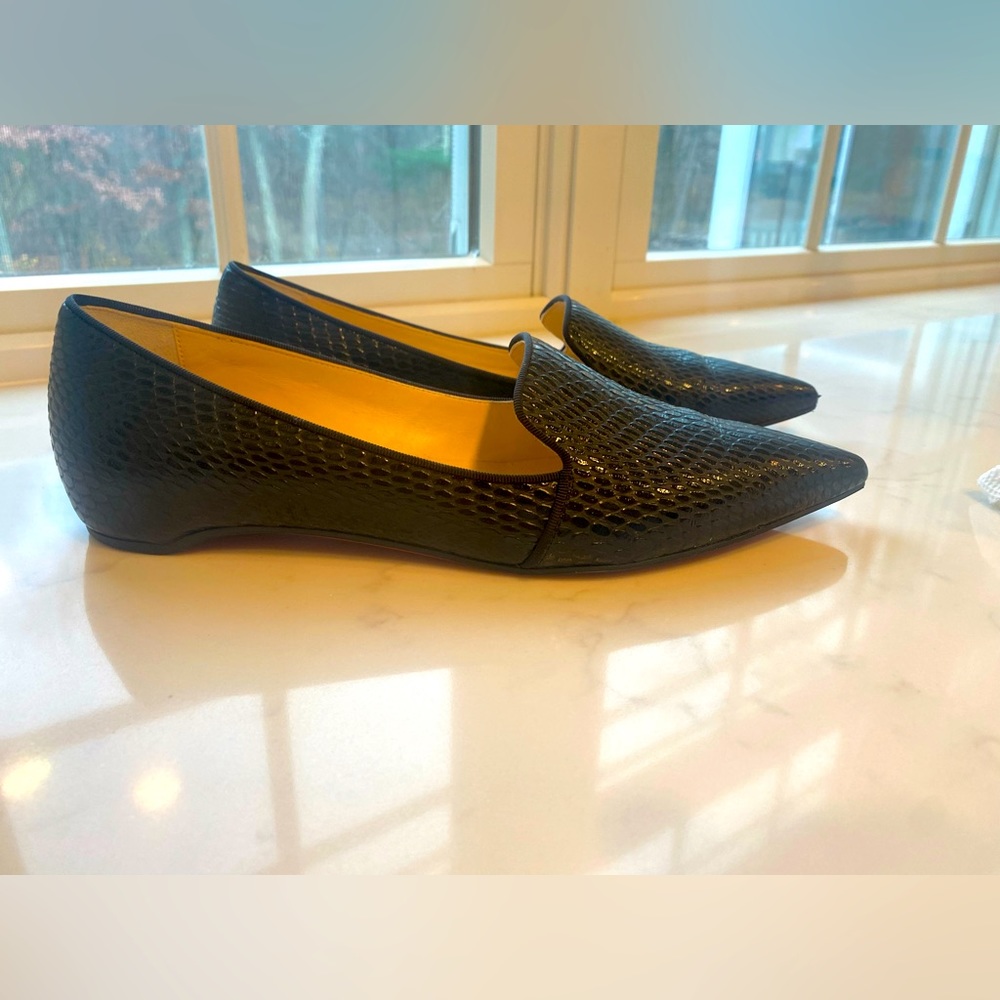 Christian Louboutin flats in black crocodile